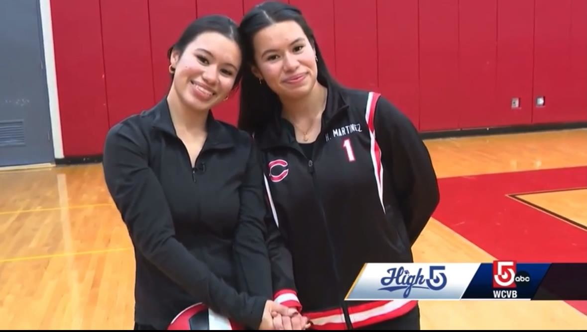 Twin sisters Ashley and Hazel Martinez pictured in the Chelsea High School gymnasium